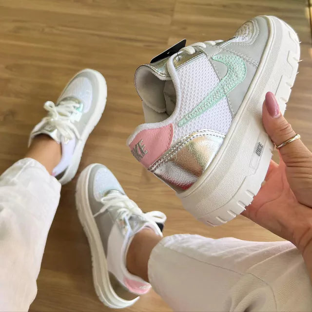 Tenis nike hot sale com brilho